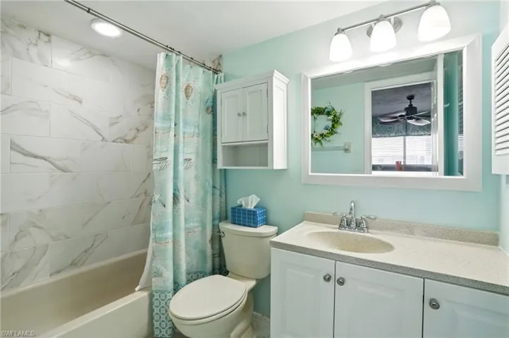 Bathroom with shower / bath combo and vanity  - Virtually Edited Image