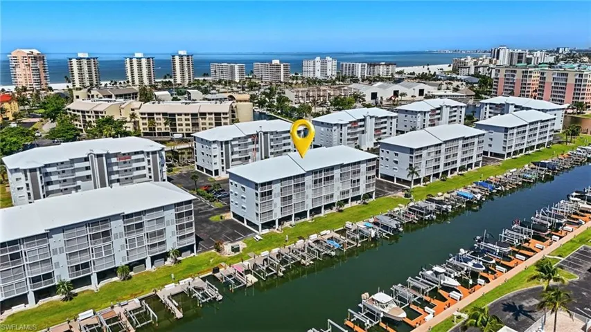 View of urban area with a nearby body of water - Virtually Edited Image