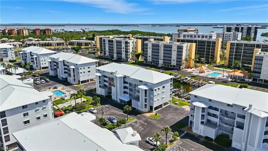 Aerial view of a nearby body of water and a pool - Virtually Edited Image