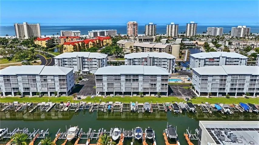 View of urban area featuring a nearby body of water - Virtually Edited Image