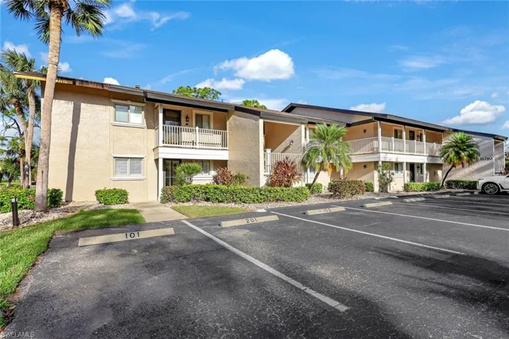 POPULAR - Corner END Unit with EXTRA Windows, Parking Just Outside the Door- Easy Access!