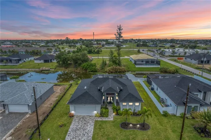 Aerial view of residential area with a nearby body of water