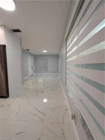 Main Entrance/ Hall with baseboards
