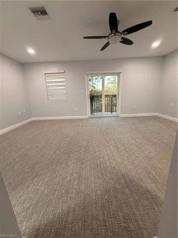 Master Bedroom featuring dark colored carpet, a ceiling fan, and recessed lighting