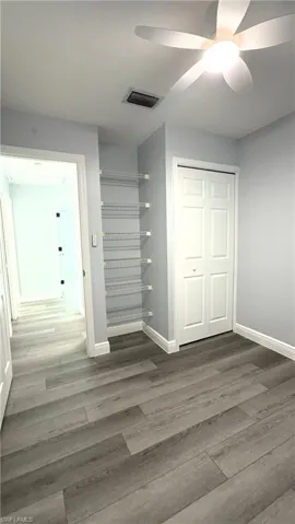 Room 2 Bedroom with closet and light