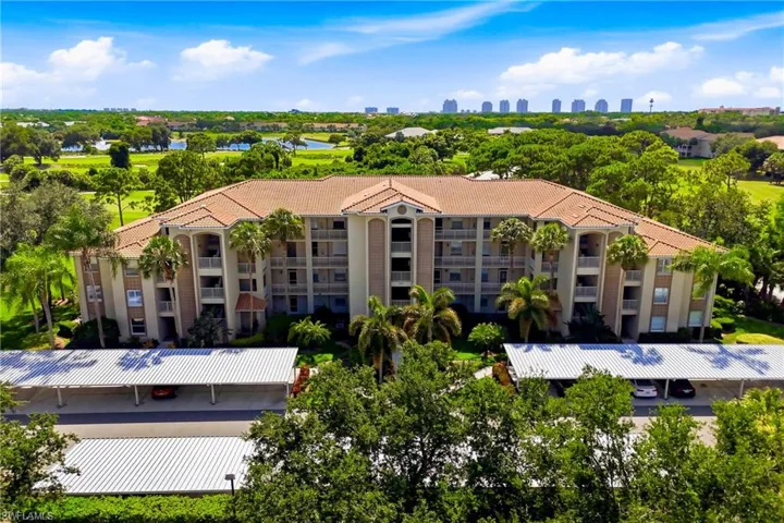 Aerial view captures the essence of Southwest Florida living with expansive fairways, tropical scenery, and an active resort lifestyle.