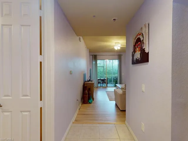 Hall featuring light wood-type flooring