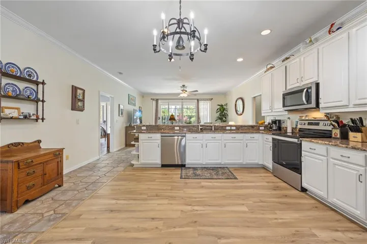 Huge kitchen with plenty of space to add an island or table.