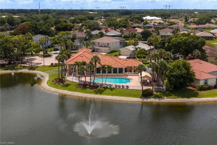 Silverlakes community pool overlooking one of the 4 lakes with a fountain.