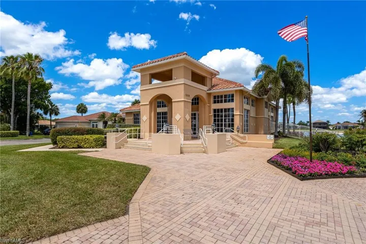 Silverlakes Community Clubhouse with brick pavers and beautiful landscape.