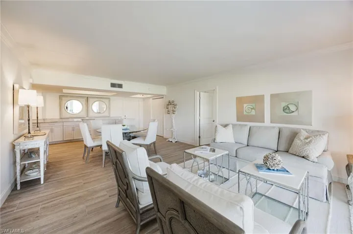 Open floor plan  through the main living areas delights the eye.