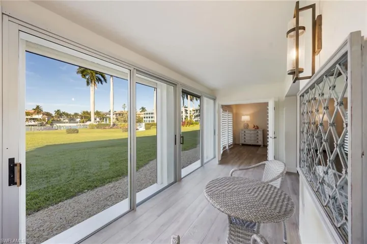 Huge lanai with wall of sliding doors