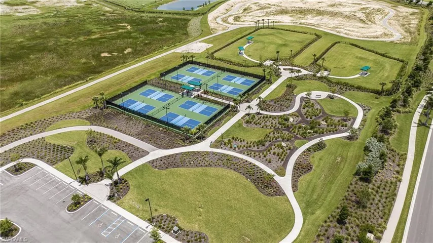 Eight Pickle Ball Courts (the intersection of fintess and fun) as well as Two Dog Parks