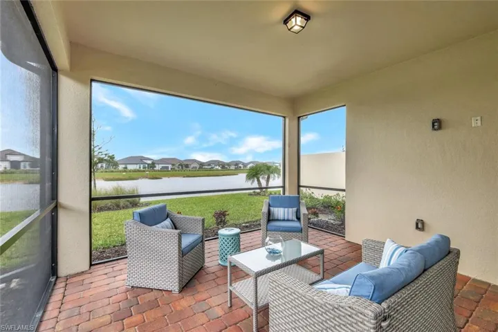 Screened in lanai with a water view - read, relax, entertain or just take in the sunset