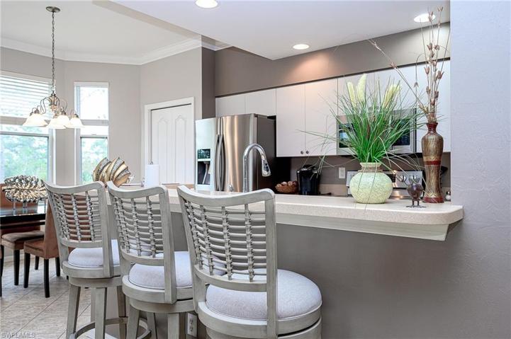 Stainless steel appliances, Corian counters