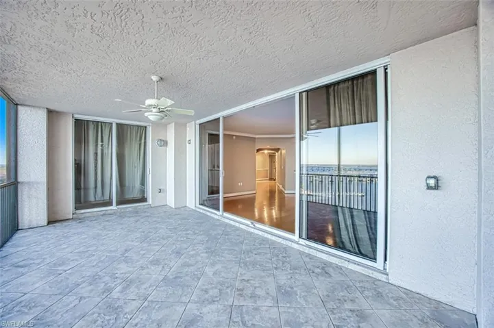 View of patio with ceiling fan