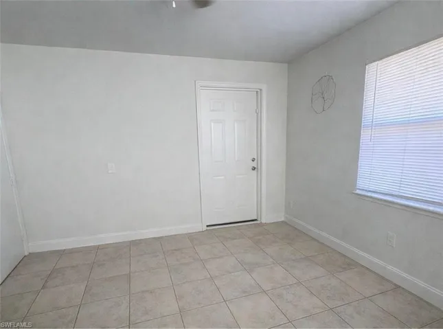 Efficiency Bedroom/Living Room light tile patterned floors