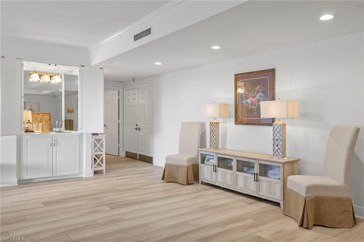 Flow from foyer to entertaining area and wet bar
