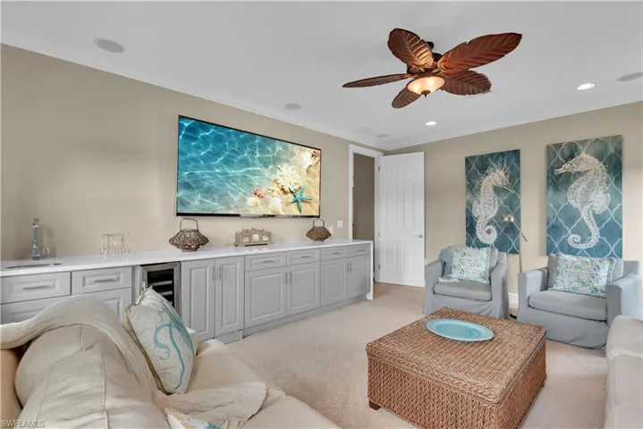 Bonus Room w/ Custom Built-In Featuring Beverage Coover & Sink