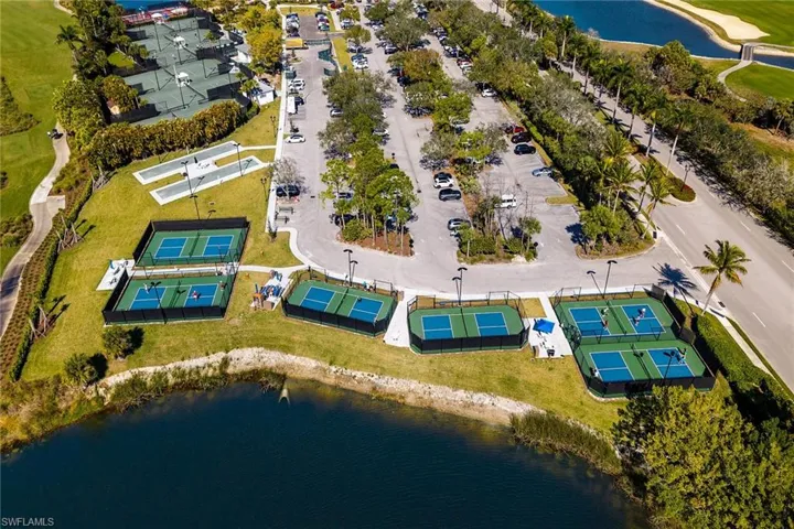Aerial view of a nearby body of water and a local golf course