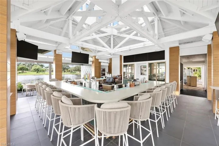 View of patio featuring a bar