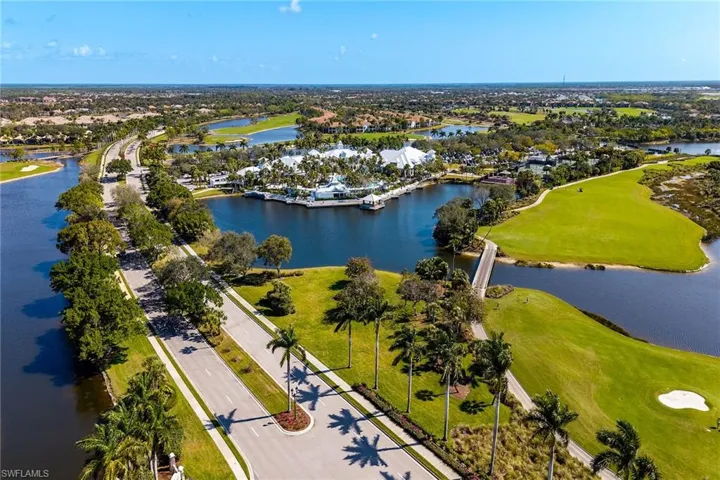 Aerial view of a golf course and a large body of water