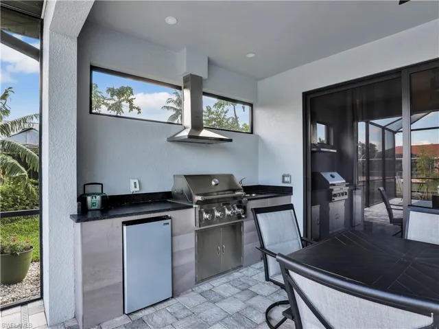 View of patio / terrace featuring area for grilling and a grill
