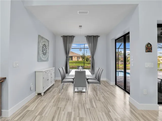 Dining space with light wood-type flooring