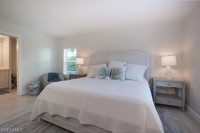 Bedroom featuring wood finished floors