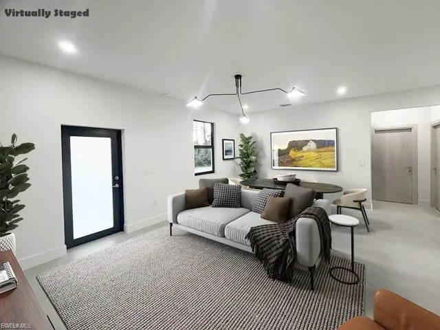 Living room featuring recessed lighting and baseboards