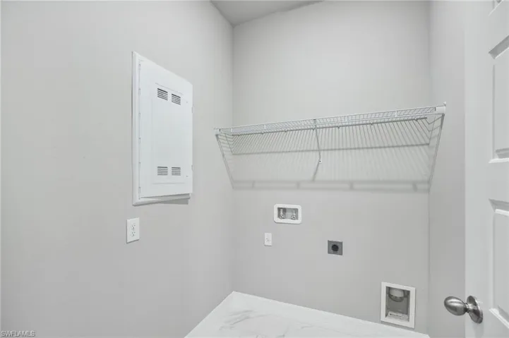 Washroom featuring washer hookup and electric dryer hookup