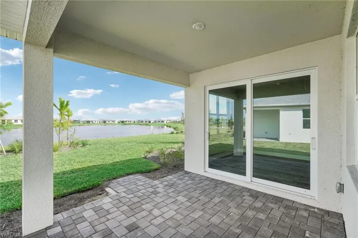 View of patio featuring a water view