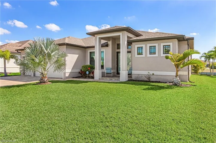 1503 NW 39th Ave, Cape Coral FL   2019 Gulf Access Pool Home, 2,279 Sq Ft, 3 Bedroom plus Den, 3 bath, open split floor plan, outdoor kitchen, large lanai, Pool and Jacuzzi, 3 car garage