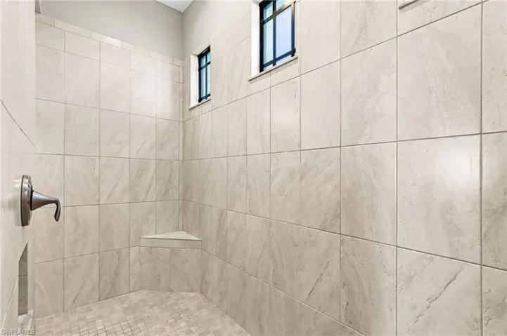Walk-in shower with entry on both sides