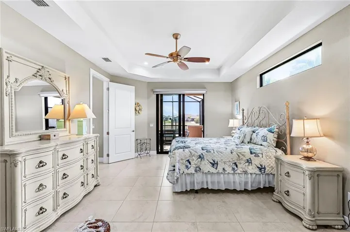 Large suite, 2 walk-in closets, entry into lanai pool area, dual vanities, soaking tub, private toilet, large storage closet, large walk-in shower