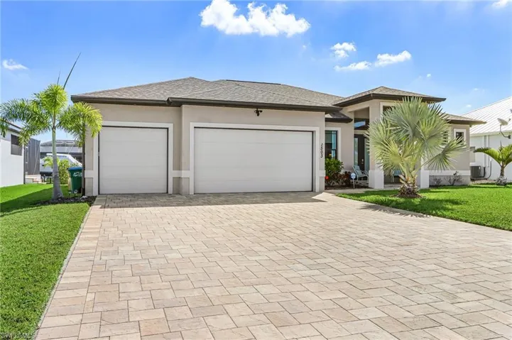 1503 NW 39th Ave, Cape Coral FL   2019 Gulf Access Pooll Home, 2,279 Sq Ft, 3 Bedroom plus Den, 3 bath, open split floor plan, outdoor kitchen, large lanai, Pool and Jacuzzi, 3 car garage