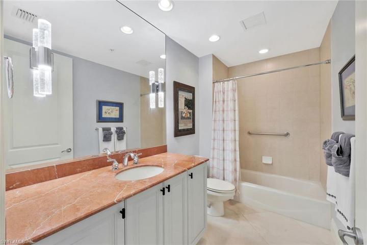 This bathroom is ideally located off the main hallway in the center of the home.