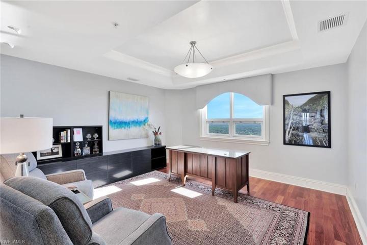 The 3rd bedroom is being utilized as a den.  The room boasts handsome wood flooring, and can be easily converted to a true bedroom with the addition of a closet.