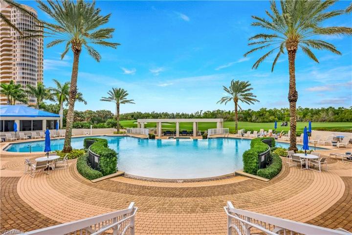 View westward at the pool and golf course from the amenities club.
