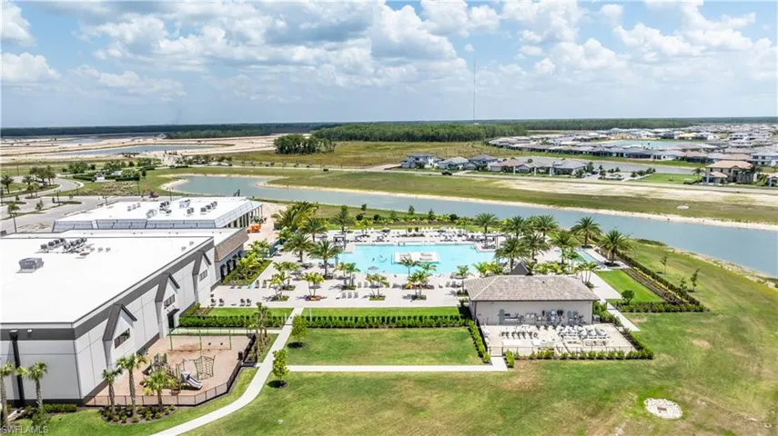Aerial view featuring pool and amenities