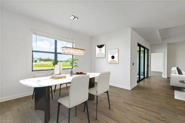 Dining area featuring  wood-style flooring