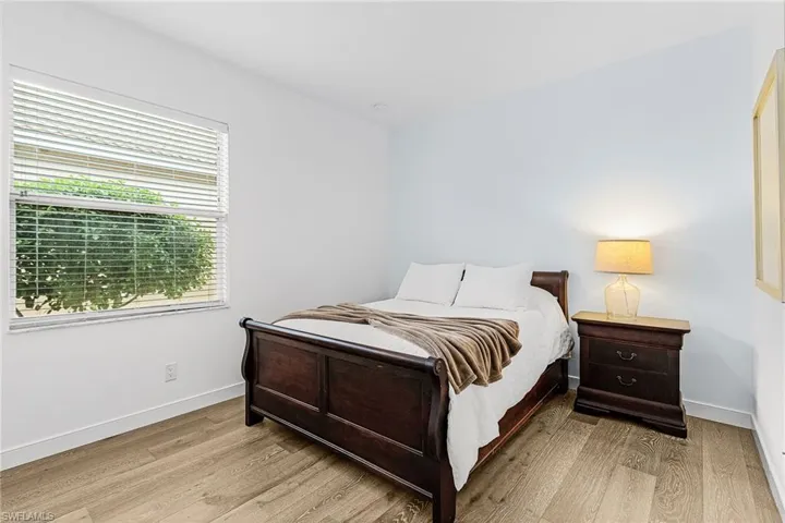 Bedroom with light wood finished floors