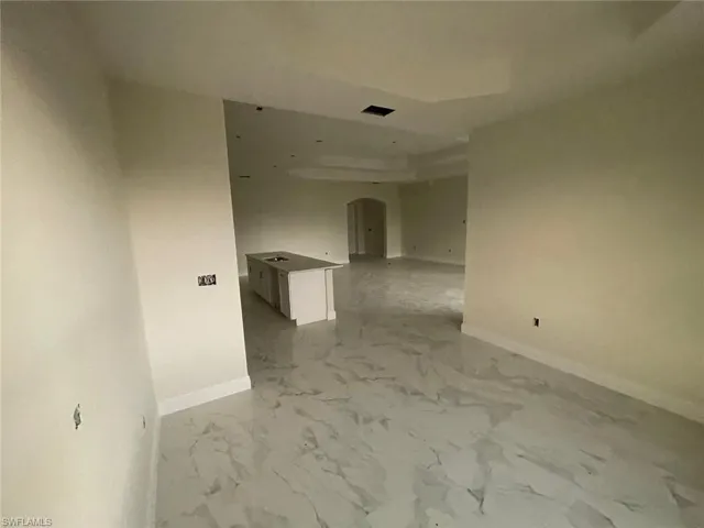 View of tiled spare room