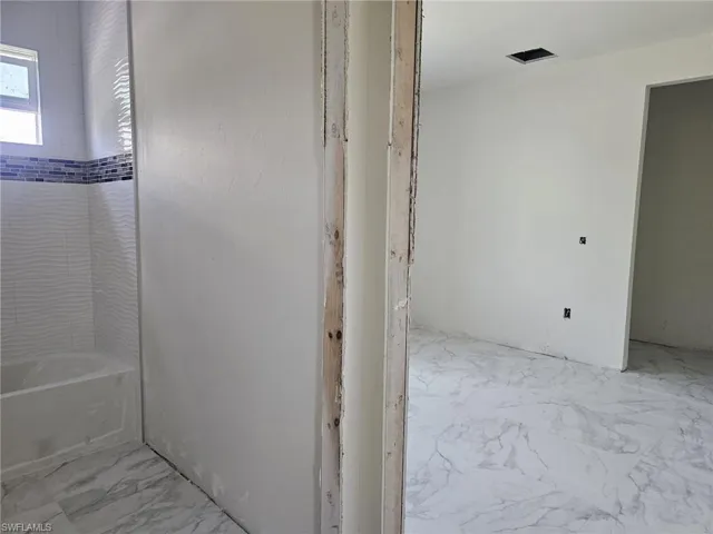 Bathroom with tile flooring