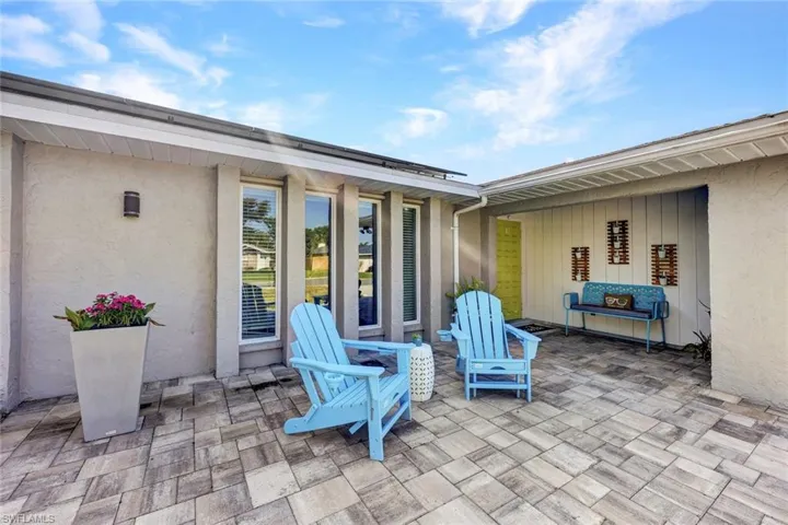 Front paver patio is perfect for neighborhood gatherings.