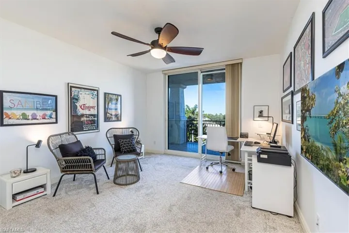 Guest Bedroom / Office or flex room.  New carpet and ceiling fan. Open Balcony Access