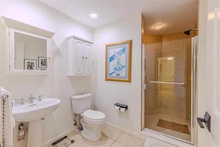 Guest Bathroom with a frameless glass enclosed shower