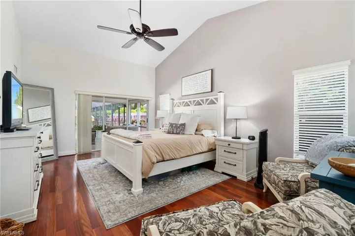 Spacious primary bedroom with sitting area, huge primary bath and custom closet.