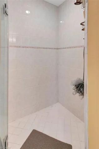 Bathroom with a tile shower