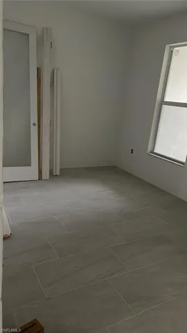 Office space with frosted, double-door entry